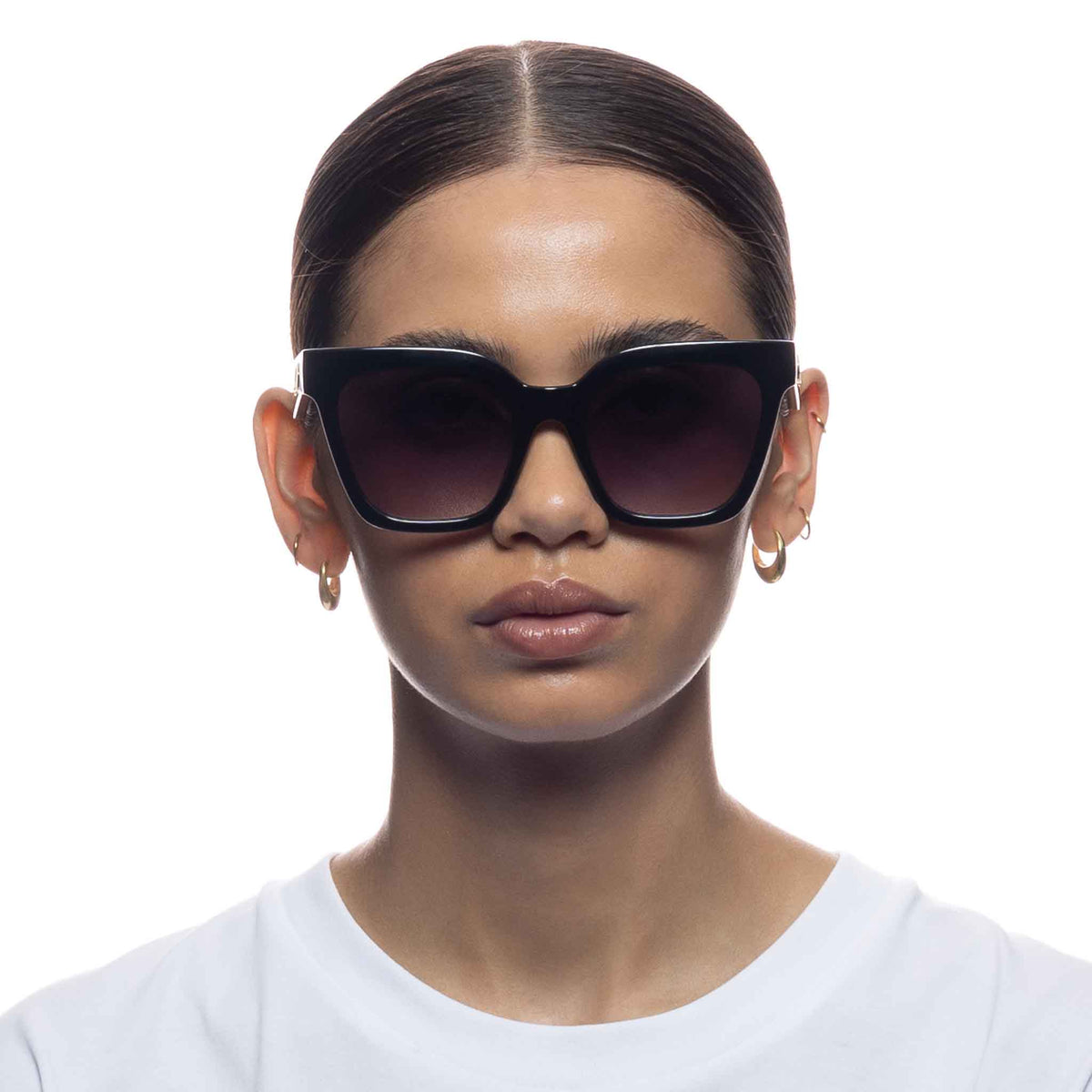 Le Specs Star Glow – Noir – verres gris dégradés – portées