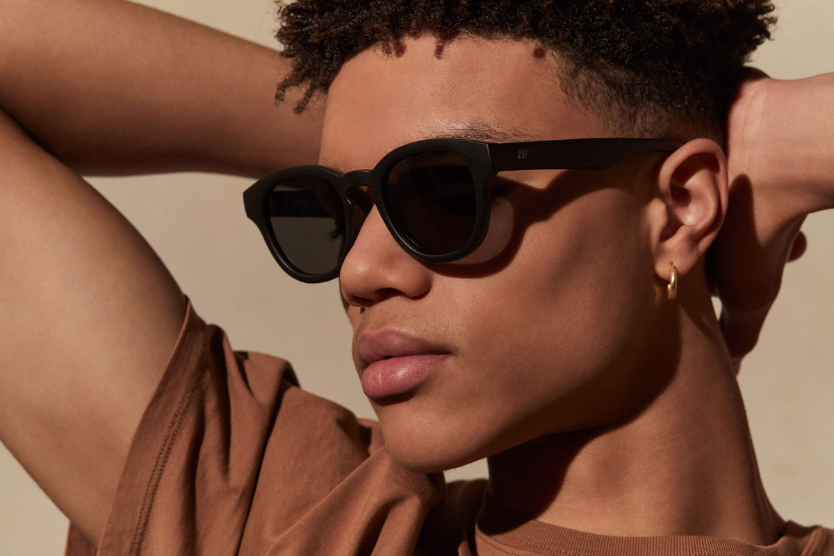 Le Specs Le Sustain Grass Band – Noir – verres verts – portées