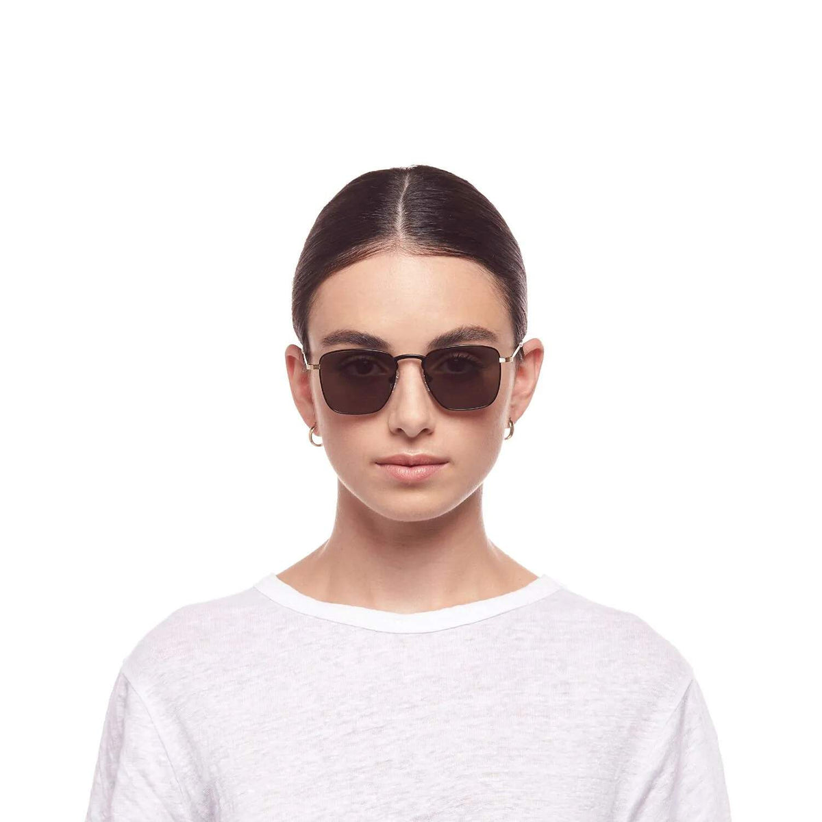 Le Specs Folsom – Noir / Or – verres verts – portées