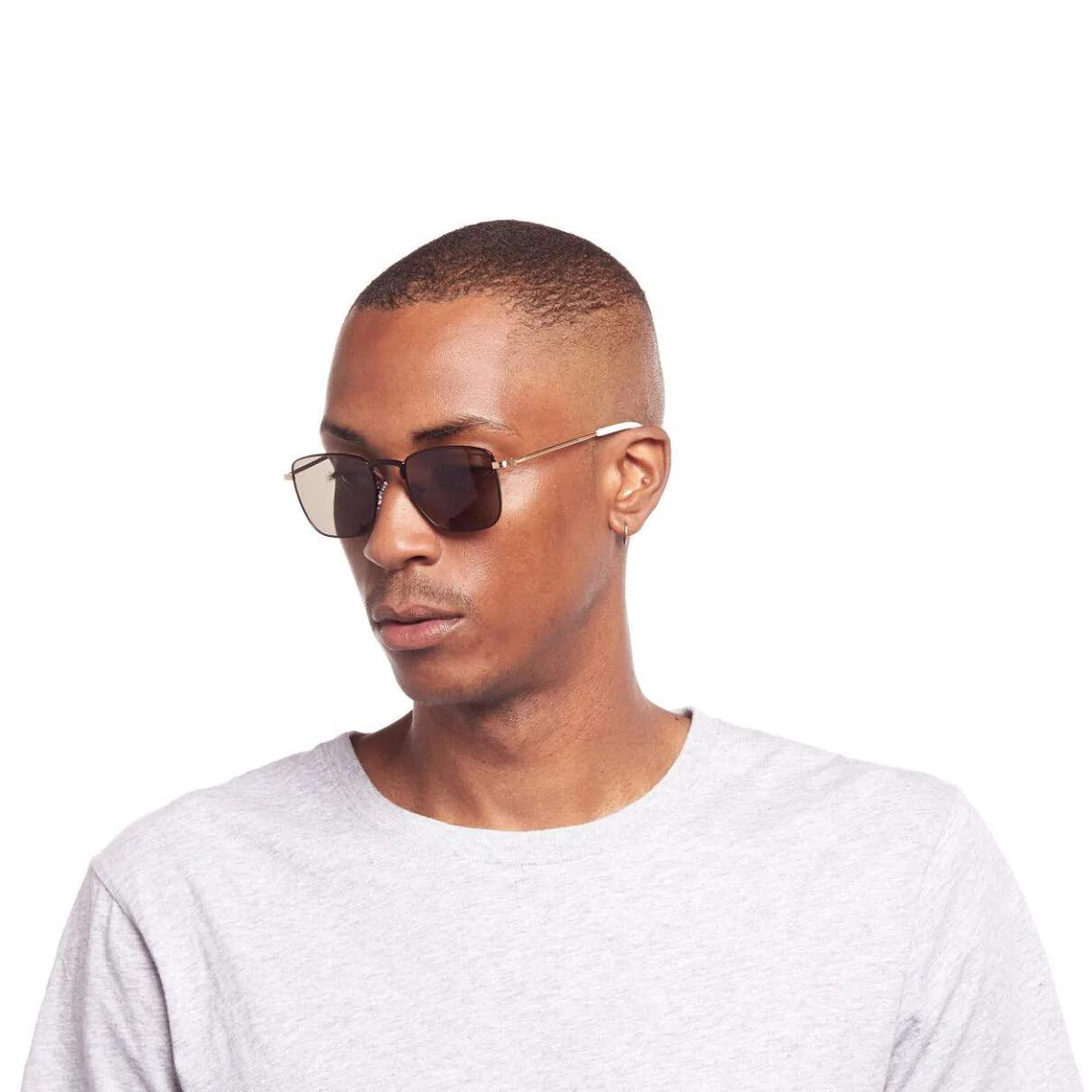 Le Specs Folsom – Noir / Or – verres verts – portées