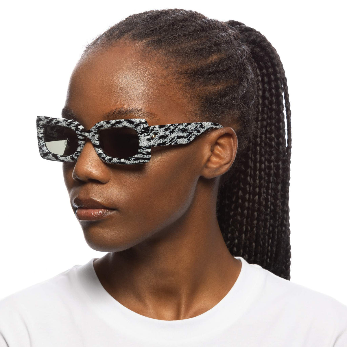 Le Specs Damnedest – Noir / Blanc – verres gris – portées