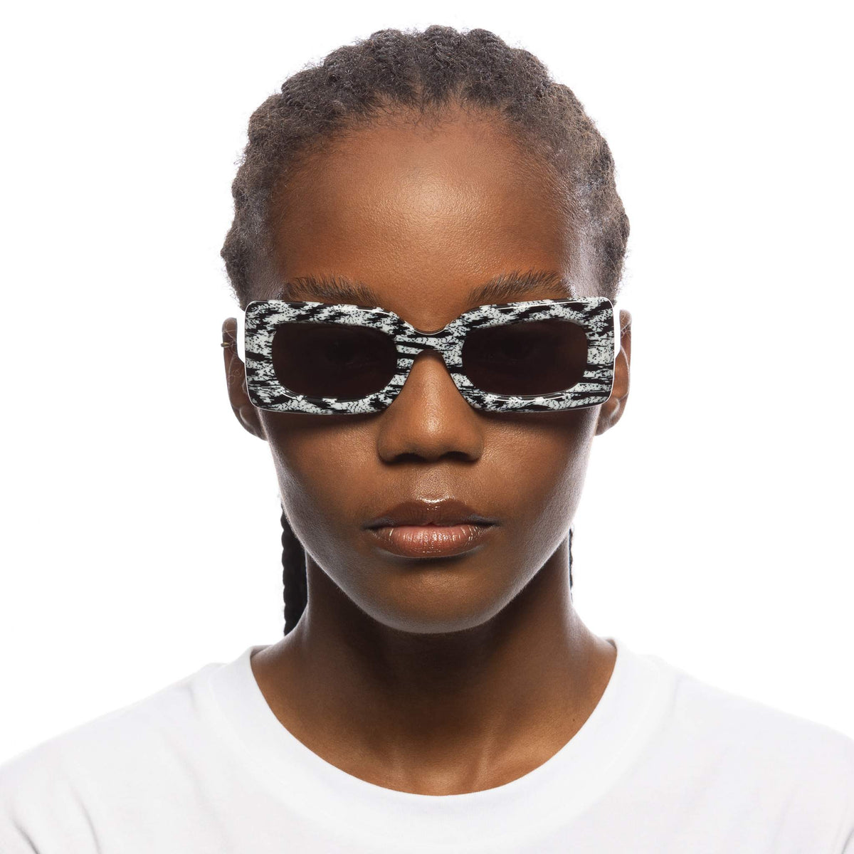Le Specs Damnedest – Noir / Blanc – verres gris – portées