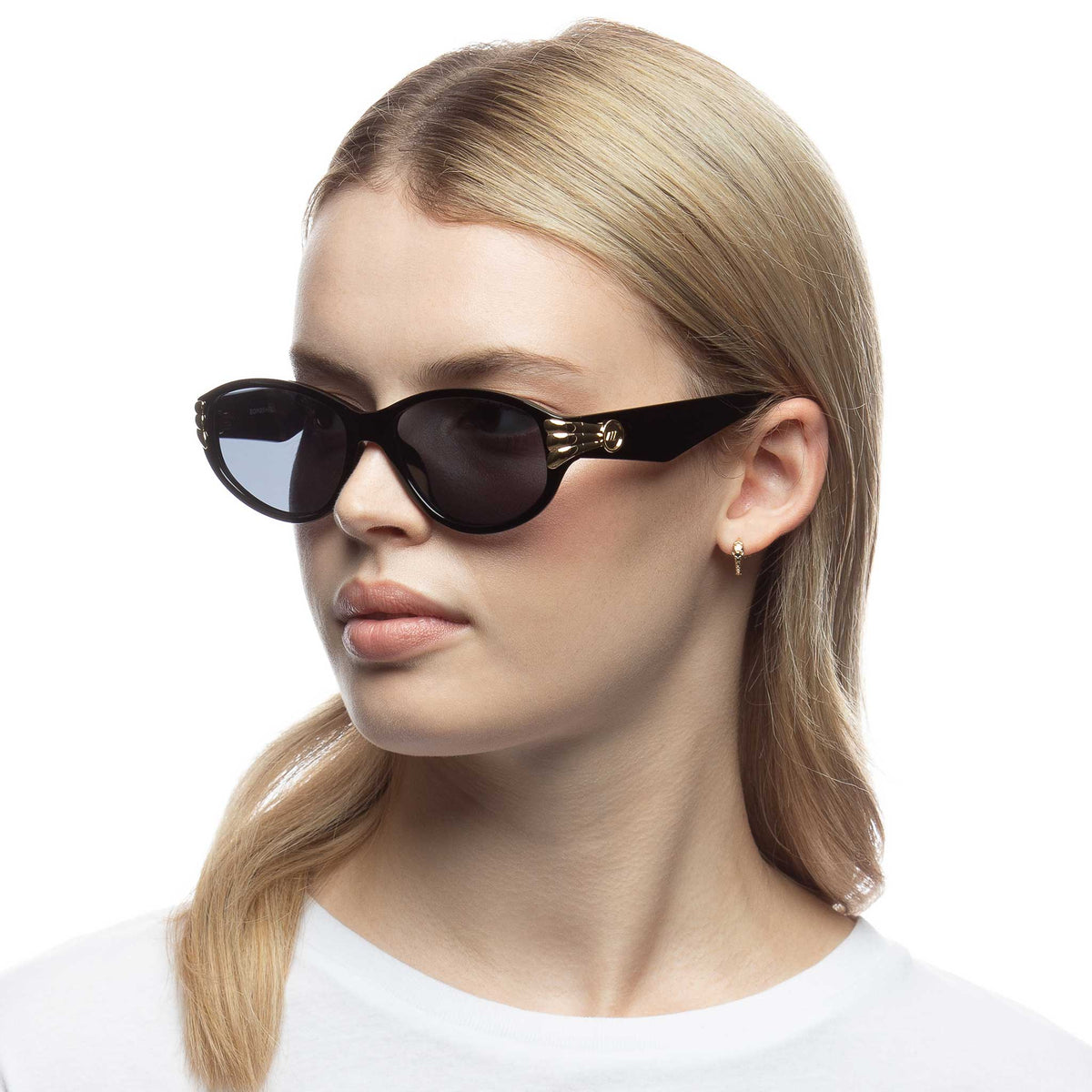 Le Specs Bombshell – Noir – verres noirs – portées
