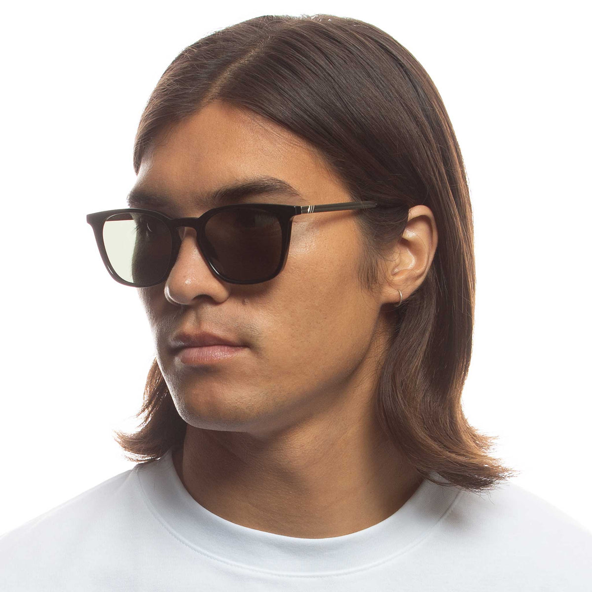 Le Specs Huzzah – Noir – verres verts – portées