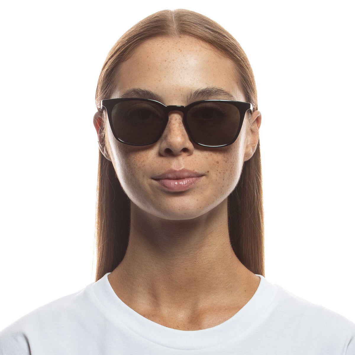 Le Specs Huzzah – Noir – verres verts – portées