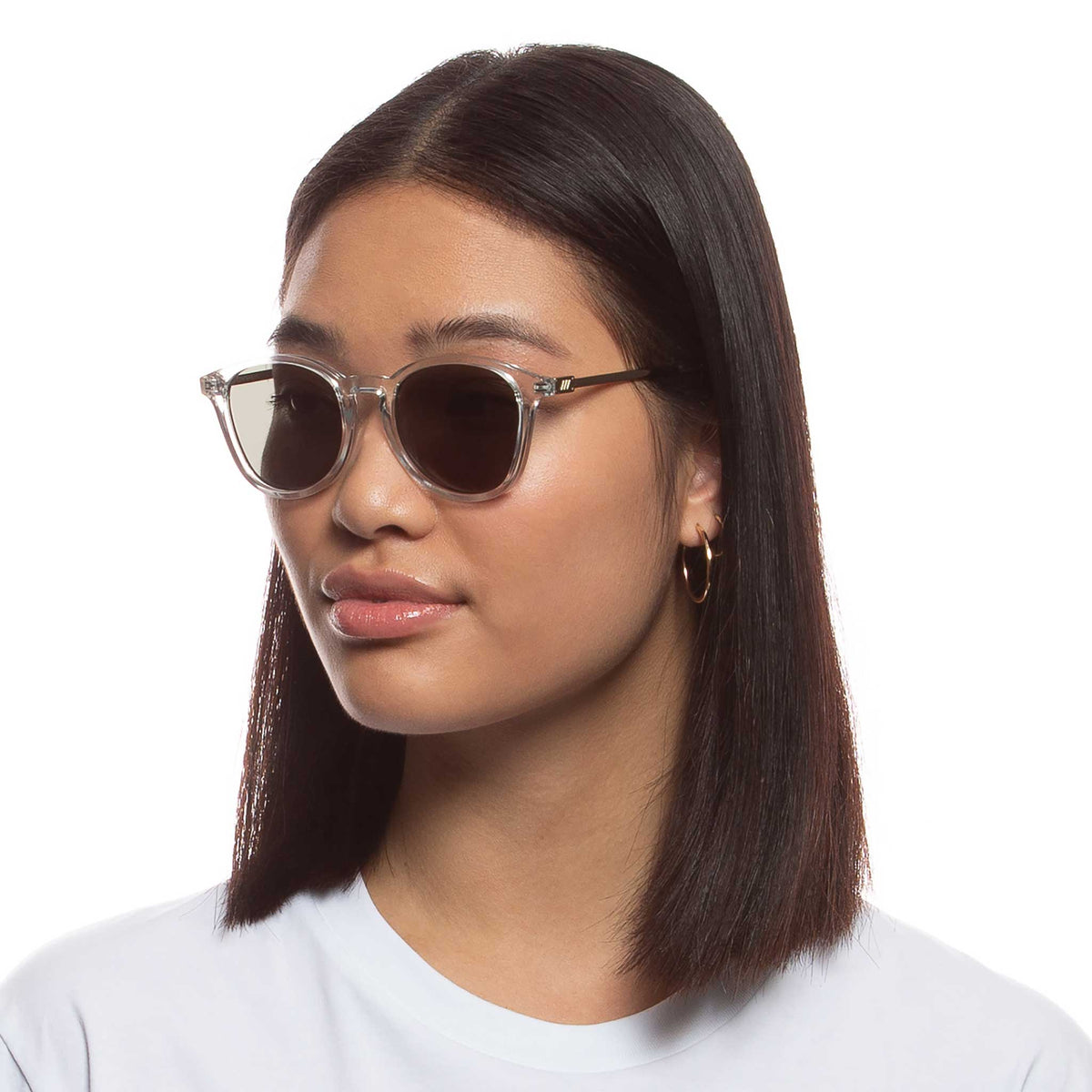 Le Specs Contraband – Transparent – verres verts – portées
