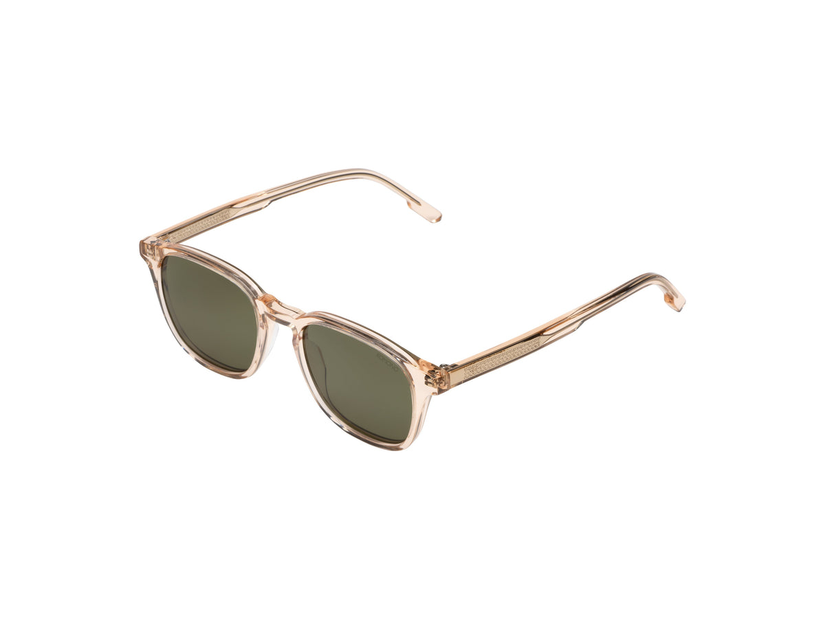 Komono Marlon – Beige transparent – verres verts – portées