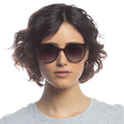 Le Specs Momala – Écaille – verres noirs – portées