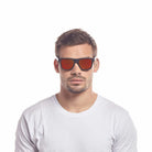 Le Specs Le Sustain Grassy Knoll – Noir – verres orange miroir – portées