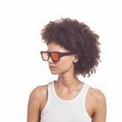 Le Specs Le Sustain Grassy Knoll – Noir – verres orange miroir – portées